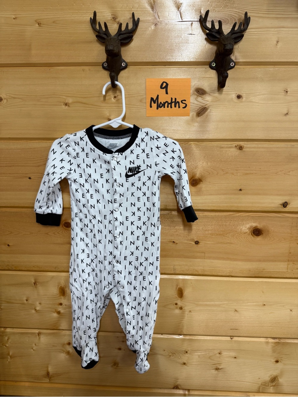 Nike White Footed One-Piece with Black Logo and Trim